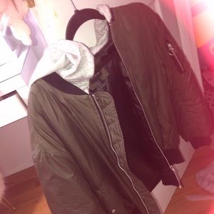 Green bomber jacket gray hoodie
